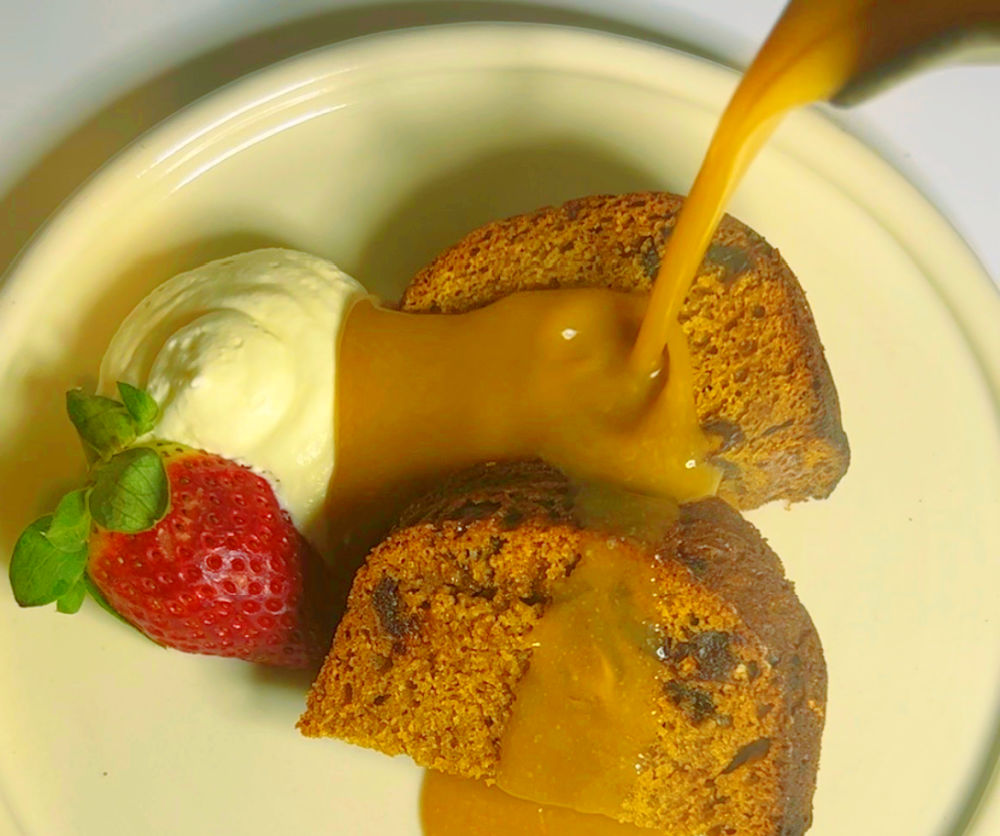 Gluten Free Sticky Date Pudding on a white plate