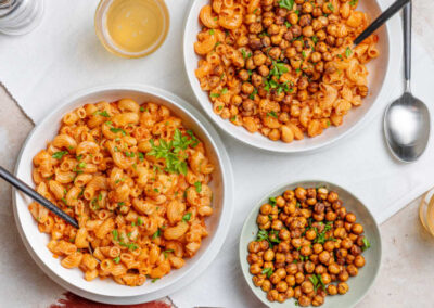 Bolognese with roasted chickpeas in white bowls