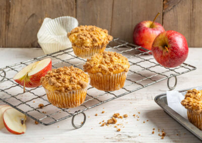 Gluten Free Apple Chai Muffins on a wire rack.